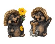 Mole standing with shovel & flower in