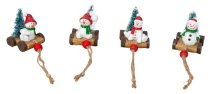 Snowman with santa hat on roll car with