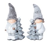 Winterchildren with fabric hat standing