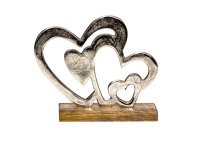 Metal 4 hearts sculptur on wooden
