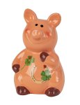 Money pig sitting with lucky symbols