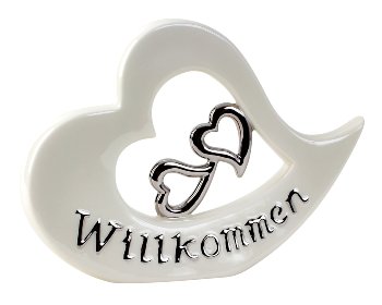 White heart-sculpture with silver words