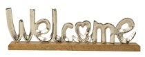 Schriftzug "Welcome" auf Holzsockel