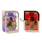 Glass decoration with flower and butter-