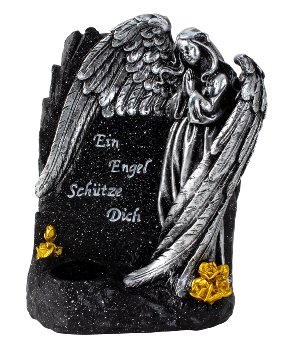 Tomb angel near stone with words +for