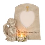 Angel beside stone for tealight & photo