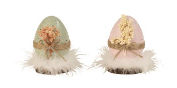 Easter eggs with flower and feather