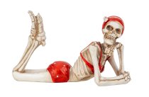 Skelett mit Bikini und Bademütze liegend