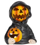 Halloween figure with pumpkin face and