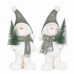 Laughing snowmen standing with tree in