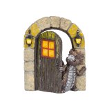 Cute dragon is standing in open door