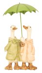 Goose couple standing with umbrella in