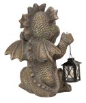 Laughing dragon standing with lantern in