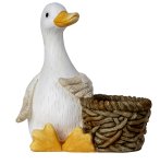 Gans sitzend neben Pflanztopf h=36cm