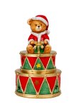Weihnachtsbär sitzend auf Trommeln