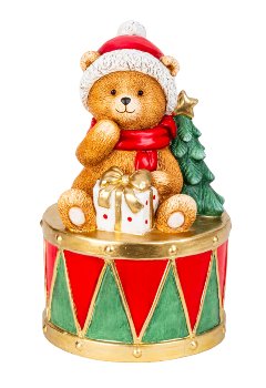 Weihnachtsbär sitzend auf einer Trommel
