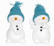 Cute snowman with turquois hat standing