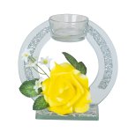 Glasdeko mit gelber Rose und