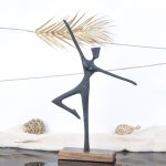 Woman-Figure in dance position on wooden