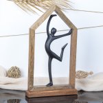 Woman-Figure in dance position in house
