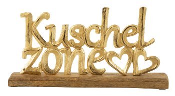 Metal words "Kuschel Zone" on wooden