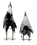 Metal cock and hen spotted standing