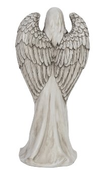 Angel without face standing in grey