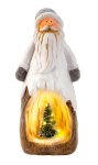 Nikolaus mit beleuchtetem Tannenbaum