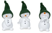 Niedliche Schneemänner stehend mit