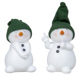 Niedliche Schneemänner stehend mit
