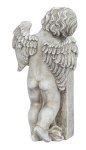 Tomb angel behind stone "Wir