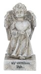 Tomb angel with heart in hand standing