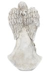 Tomb angel standing with words "Wir