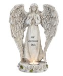 Tomb angel standing with words "Wir