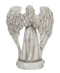 Tomb angel standing with words "Wir