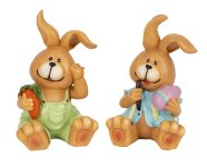 Eastern rabbit sitting with egg & carrot