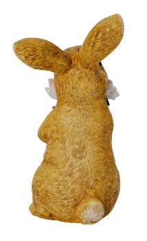 Easter rabbit standing with bouquet of