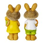 Easter rabbit standing with flower & egg